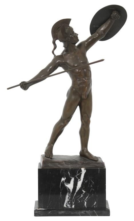 Bronze Sculpture of a Warrior: Bronze sculpture depicts a warrior with a shield in his left hand and a spear in his right, standing atop a rectangular marble base, signed "Zwierzcjowski." Very good condition with a green-brown pati