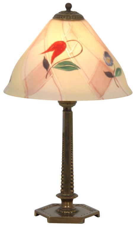 Pairpoint Carlisle Boudoir Lamp: Pairpoint boudoir lamp has a Carlisle shade with reverse painted flowers, signed "The Pairpoint Corp'n." Supporting the shade is a gilt metal base with beaded decoration and hexagonal platform, signed
