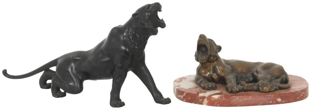 Two Bronze Lion Sculptures: Two bronze sculptures depicting a standing roaring lion with Asian markings and a reclined roaring lion signed "T. Curts fec." 7 3/4 in. high x 14 1/2 in. wide (largest), 5 in. high x 10 1/5 in. wide 