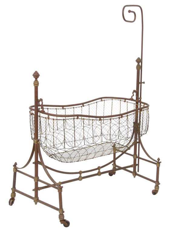 19th Century French Iron Crib: French iron crib, circa 19th century. 58 in. high x 40 in. wide x 22 in. deep.