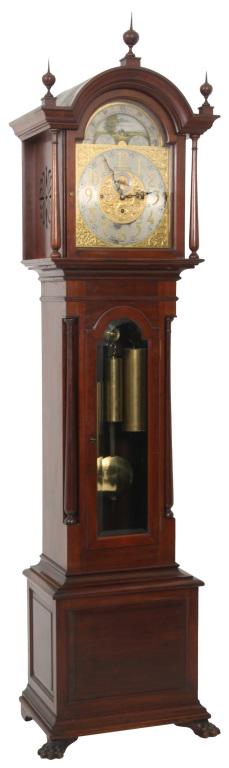 J.J. Elliott, London, Tall Case Clock: J.J. Elliott, London, Tall Case Clock, brass scroll and silvered dial with upper moon phase dial, 8-day brass movement striking Westminster chimes on 4 coiled gongs, movement signed "J.J. Elliott, 5 P