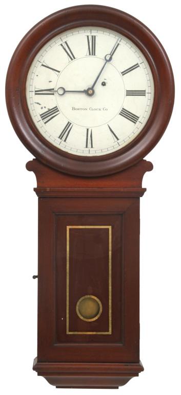 Boston Clock Co. Wall Regulator Clock: Boston Clock Company wall regulator clock with cherry case retaining the original finish, signed 12-inch painted dial, 8-day brass movement having recoil escapement, serial number 600, clock is all or