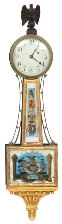 Herschede "Willard" Presentation Banjo Clock: Herschede "Willard" presentation banjo clock with brass 8-day, weight driven, time only movement, mahogany case with gilt front and bracket, original glasses with the lower depicting a naval battle, o