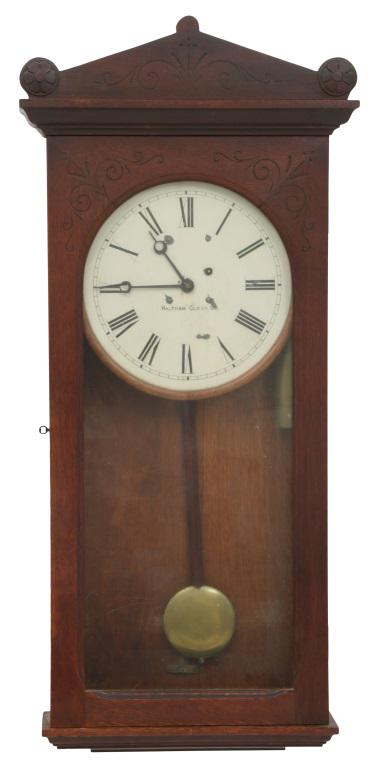 Waltham "Model 35" Wall Regulator Clock: Waltham "Model 35" wall regulator clock with 8-day brass movement, deadbeat escapement and maintaining power, original painted dial with minor paint loss, original finish, running, 10.75 in. chapter r