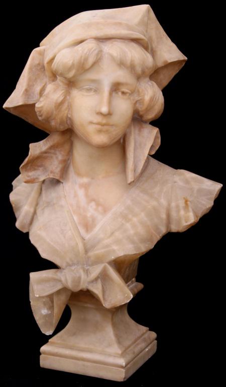 Alabaster Sculpture of a Woman: Alabaster sculpture depicting a bust of a woman wearing a headdress and garments with a tied bow, early 20th century, signed on the back, 25 in. high x 16 in. wide x 9 in. deep.
