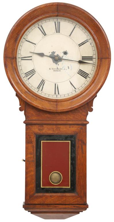 E. Howard & Co. No. 70 Oak Wall Regulator: E. Howard & Co. no. 70 oak wall regulator with original 12-inch painted dial having paint loss and touched up areas, oak case retaining original finish with nicks and dents to front door, glasses are 