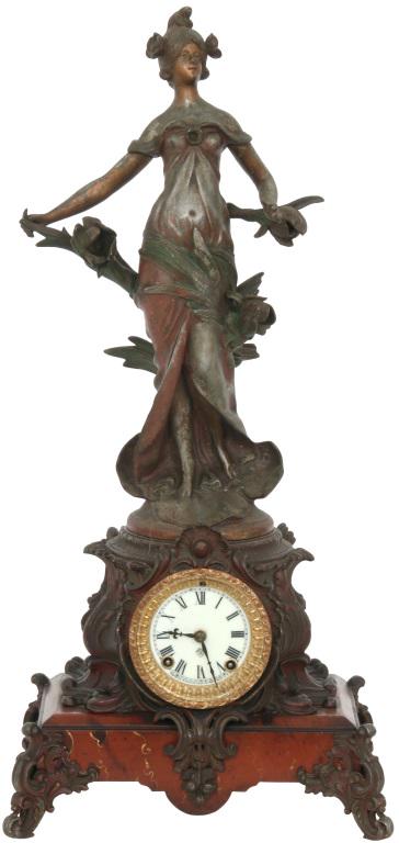 Ansonia "Cymric" Mantel Clock: Ansonia mantel clock with "Cymric" red faux marble base and "No. 1175" Art Nouveau style statue of a woman, figure is worn, porcelain dial (hairlines) and hands are original, original pendulum, gong s