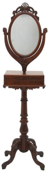 Carved Walnut Shaving Stand: Carved Walnut Shaving Stand. Oval mirror on a turned post has a pierced filigree carved crest and leaf carved harp; hinged lids on the top of the stand have open interiors for storage and burled walnu
