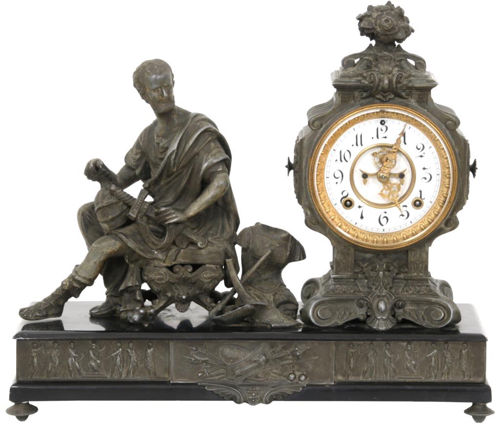 Ansonia "Cincinnatus" Figural Mantel Clock: Ansonia "Cincinnatus" Figural Mantel Clock, enameled black iron base with patinated metal figure flanking a brocot escapement clock, signed 8-day brass time and strike movement with very nice porcelai