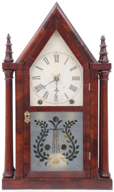 Brewster and Ingrahams Gothic Steeple Clock: Brewster and Ingrahams gothic steeple clock with refinished mahogany case, 8-day time and strike brass movement having the original brass mainsprings, glasses have been replaced, original painted dial