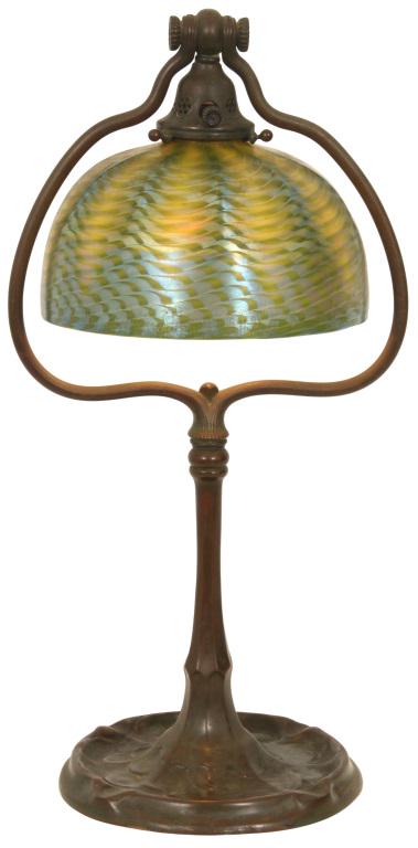 Tiffany Studios "Harp" Desk Lamp: Tiffany Studios "Harp" Desk Lamp circa 1910 Favrile glass, patinated bronze shade signed "L.C.T. Favrile" base signed "Tiffany Studios, New York, 590" 19 in. high, 8 in. diameter