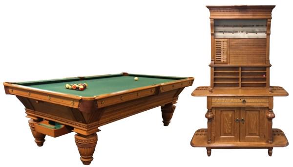 Brunswick-Balke-Collender Co. Pool Table: Brunswick-Balke-Collender Co. Pool Table, circa 1910, with large turned legs and leather pockets, ball return mechanism has a box at one end with a felt covered serpentine groove, a knob above the bal