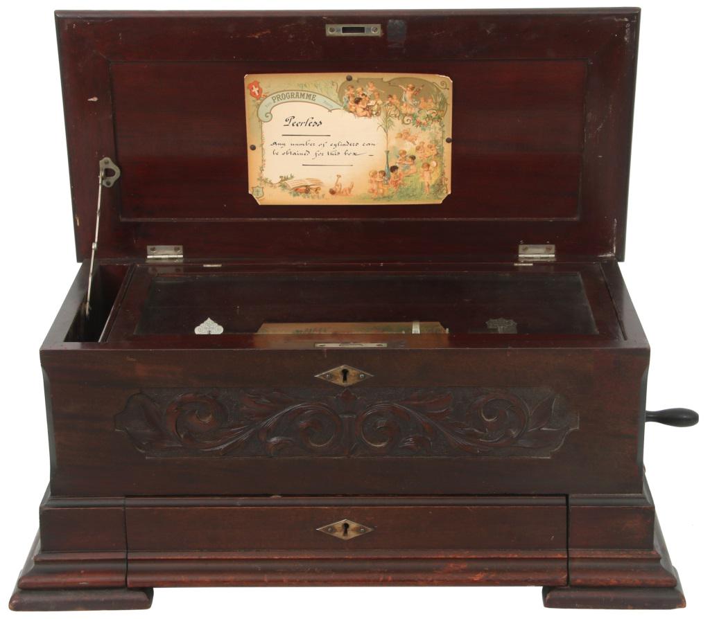 Jacot Music Box Co. Cylinder Music Box: Jacot Music Box Co. (New York, NY) Cylinder Music Box circa 1889 mahogany signed with metal tag 11 x 25 1/2 x 13 1/2 inches