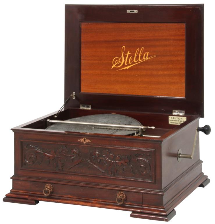 Stella Mahogany Music Box: Stella (Switzerland, 19th/20th century) Music Box circa 1897 mahogany signed with metal tag, stenciled "Stella" 13 1/2 x 29 x 22 inches