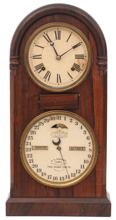 Ithaca No. 5 Rosewood Calendar Clock: Ithaca No. 5 Rosewood Calendar Clock, Ithaca, New York, circa 1880, rosewood case with rounded top, dials are paper replacements, 8-day time and strike movement by E.N. Welch with club tooth escapemen