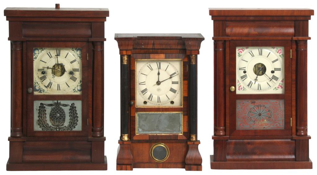 Three Seth Thomas Clock Company Shelf Clocks: Three Seth Thomas Clock Company Shelf Clocks, Connecticut, late 19th century. 1) 30-hour half column clock with a mahogany veneered case, signed "lyre" movement, Original dial with areas of paint loss