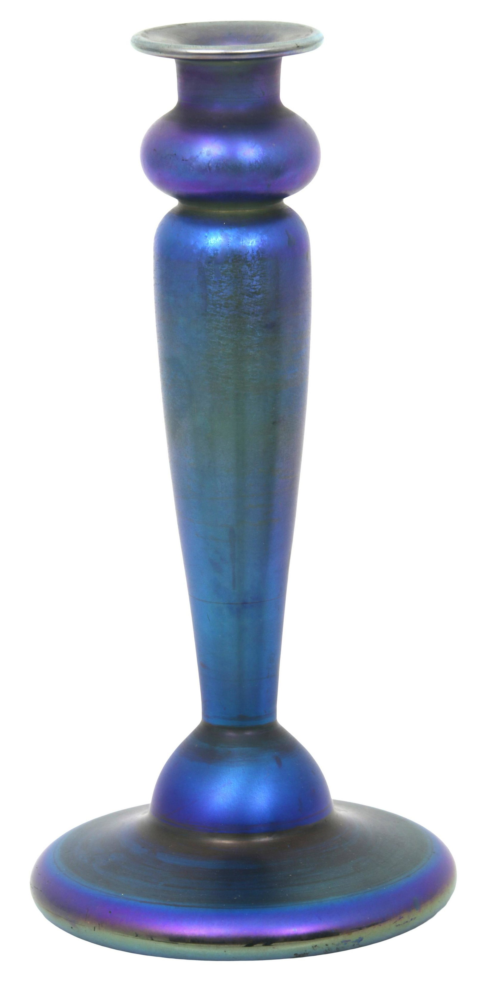 Quezal Iridescent Glass Candlestick: Quezal Art Glass & Decorating Company (New York, 1901-1924) Candlestick circa 1920 iridescent glass signed "Quezal" 10 in. high