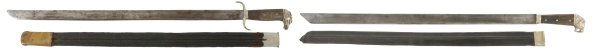 Lot of Two Machetes: Lot of Two Machetes. One German and marked, "Luckhaus & Gunther" and with sheep carrying a flag. Has a gilt brass lion's head pommel with yellow glass eyes, horn grip and no guard. Come with its origi