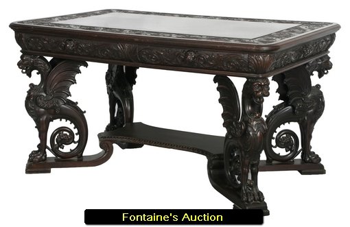 RJ Horner Winged Griffin Mahogany Partners Desk: RJ Horner Winged Griffin Mahogany Partners Desk. Heavily carved partners desk with figural winged griffin with scrolled tails; swirling leaf carved apron with lion's head pulls, functional right hand 