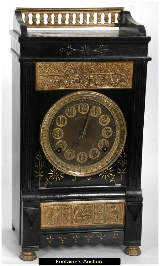 ANSONIA TURIN MODEL IRON CASE SHELF CLOCK: ANSONIA TURIN MODEL IRON CASE SHELF CLOCK. Ansonia Turin Model Iron Case Shelf Clock. Ht. 16"This was a high grade fairly expensive model with fancy inserts on the case. The rubber dial (Gutta Percha)