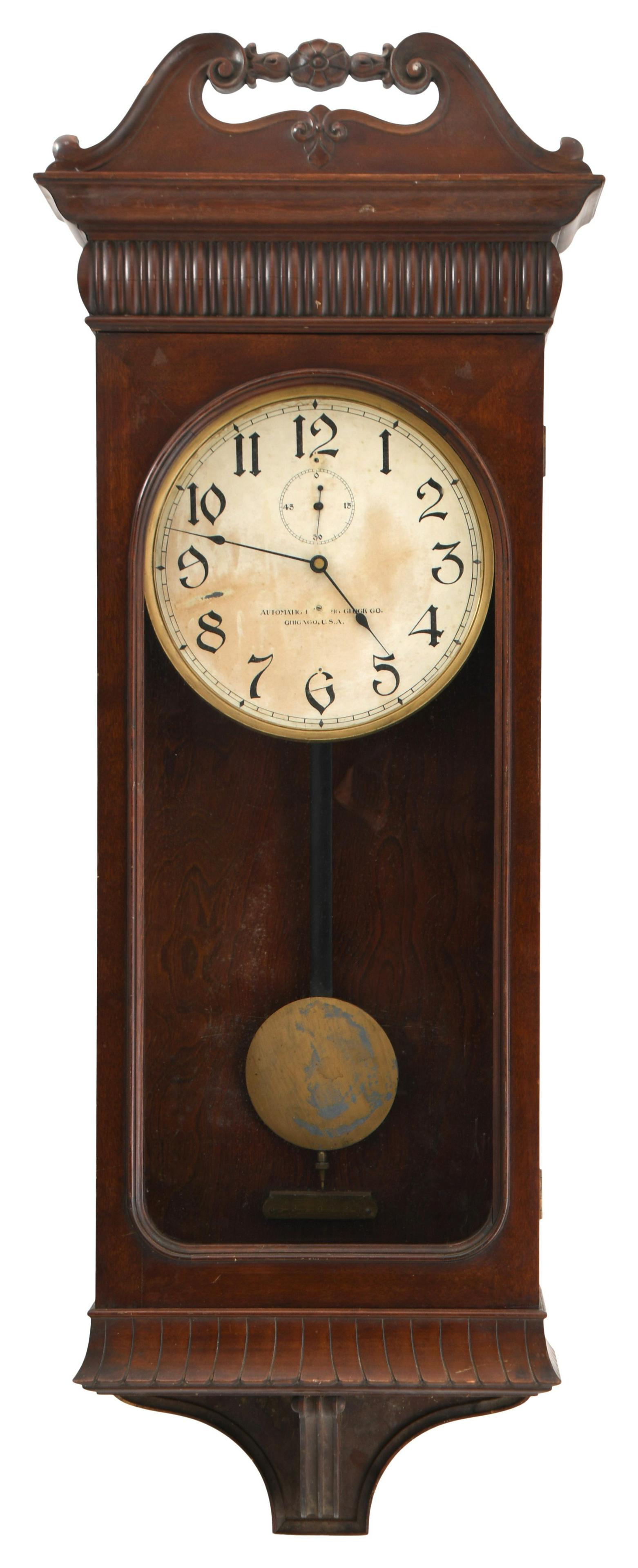 Automatic Electric Clock Co. Wall Clock: Automatic Electric Clock Co. Wall ClockChicago, early 20th centurythe mahogany case with broken arch crest, battery operated pendulum movement, dial signed "Automatic Electric Clock Co., Chicago,