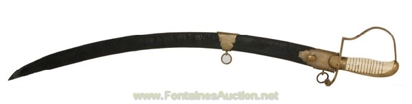 ENGLISH CAVALRY SABER W/ IVORY HANDLE: Circa 1797. This English cavalry saber is marked in gold on the blade ?S & K?, has a ?D? shaped brass guard and a carved ivory handle. The blade is etched and blued; complete with a leather scabbard w