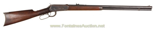 3Winchester Model 1894 Lever Action: 26" Octagon barrel with full magazine is chambered for 38-55 and has a fair bore. This is an early gun, made in 1896 with SN# 56,886. The barrel and magazine retain about 70% of their original blue an