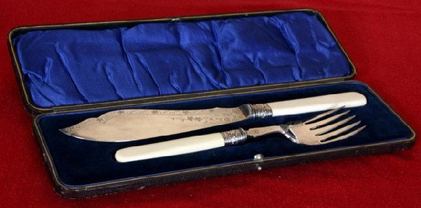 2 Pc. Allen & Darwin Sheffield Plated Fish Set: 2 Pc. Allen & Darwin Sheffield Plated Fish Set in original case. A fine fish fork & serving knife, both with mother of pearl handles, and fancy floral etching on the silver; the plating is intact and 