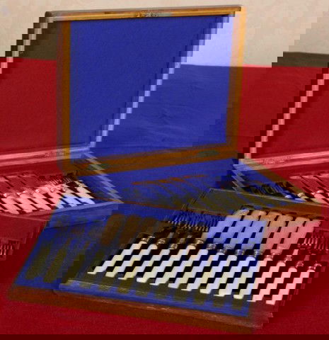 Atkins Bros Sheffield Plate Fish Service For 12: Atkins Bros Sheffield Plate Fish Service For 12. Original oak case with lift out drawer; the set includes 12 fish knives and 12 forks with ivory handles and etched silver plated blades. In excellent c