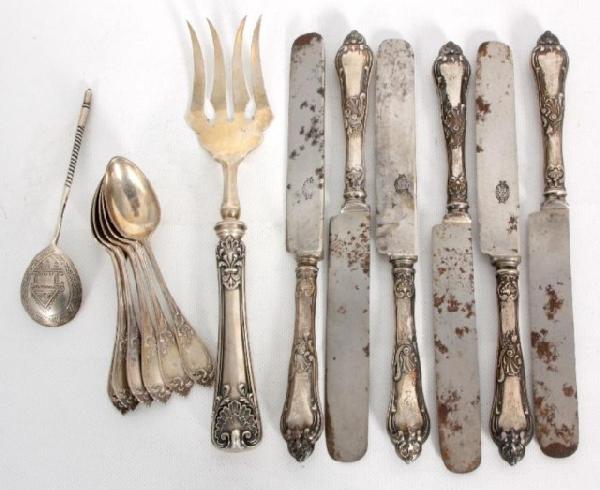 14 Pcs of Russian Silver Flatware 14 Pcs of Russia: 14 Pcs of Russian Silver Flatware. Large holloware meat fork, marked Faberge (88 zol), 6 Russian hollowware table knives, single Russian spoon and a set of 6 tea spoons with Latvian "875" silver marki