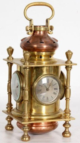 Brass & Copper Lantern Clock Brass & Copper Lanter: Brass & Copper Lantern Clock. An exceptional desk clock in the form of a lantern with 3 functioning sides, each having a 2.25" dial, The front dial for time with black roman numerals, one side is a fa
