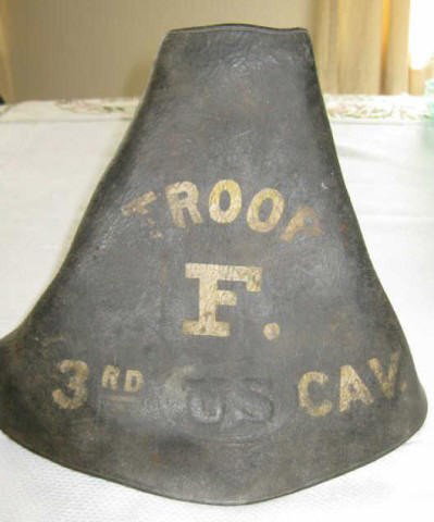 Civil War Union Leather Hooded Saddle Stirrup: Civil War Union leather hooded saddle stirrup with excellent markings. Leather hood wrapped and fastened to wooden form, with six copper rivets and burrs. Leather hood is embossed with , “US” at l