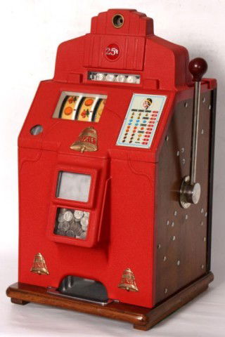 O.D. Jennings Dixie Bell 25 Cent Slot Machine: O.D. Jennings Dixie Bell 25 Cent Slot Machine (C. 1937). 25 Cent slot machine in good working condition, partial decal on side, w/ key. 28H x 15" x 15""