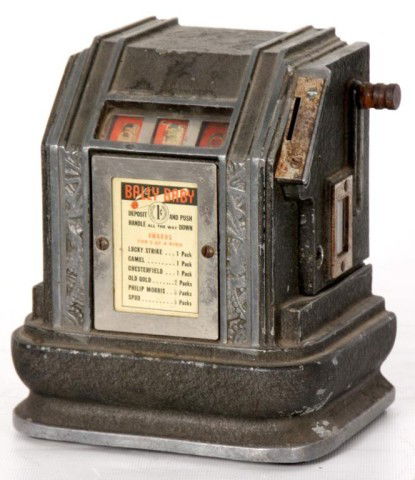 Bally Baby 1Cent Trade Stimulator: Bally Baby 1Cent Trade Stimulator. 3 Reel cigarette slot machine in good working condition; circa 1936.