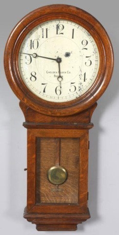 Chelsea No. 1 Keyhole Regulator: Chelsea No. 1 Keyhole Regulator. 12" Painted metal dial with black arabic numbers, signed Chelsea Clock Co. Boston, some flaking to dial; black open moon hands. Brass 8 day weight driven movement, rec