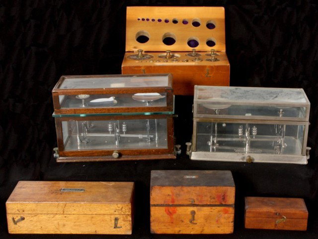 2 Scientific Torsion Balance Scales w/ Weights: 2 Scientific Torsion Balance Scales w/ Weights. Chrome cased scale signed The Torsion Balance Co. and an unsigned oak cased scale, both working with good glasses. 4 Assorted boxed sets of brass weight