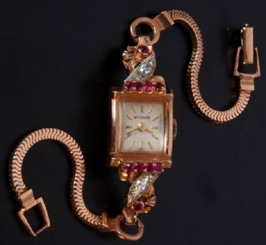 Wittnauer 14K Gold Ladies Watch: Wittnauer 14K Rose Gold Ladies Watch; set with 10 rubies and 6 diamonds, 17 jewel movement .
