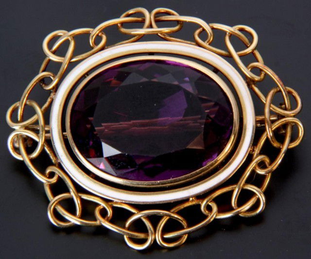 18K Gold Large Amethyst & Enamel Pin: 18K Gold Large Amethyst & Enamel Pin. Large oval purple amethyst bezel set with an elegant white enamel border and an 18K yellow gold twisted link outer border. 45mm High; 0.68 oz.