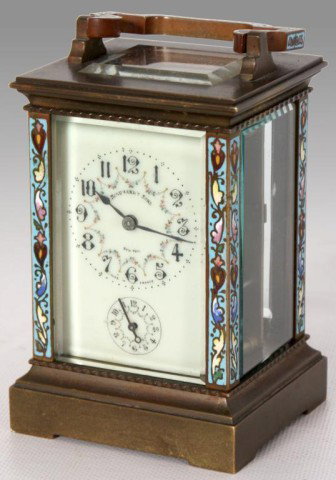 French Champleve & Brass Carriage Clock: French Champleve & Brass Carriage Clock. Simple brass case with champleve floral enamel on the corners and handle. Enameled dial with black Arabic numerals, floral decoration, sub alarm dial, black sp