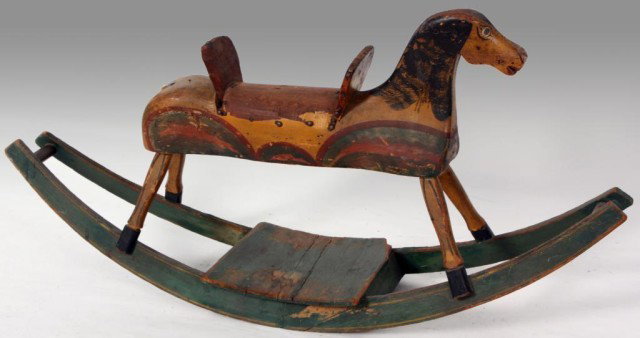 Early Painted Rocking Horse Attr: B.P. Crandall: Early Painted Rocking Horse Attributed to American toy maker Benjamin Potter Crandall (1853-1856). Fine painted tones with yellow, red green and black old original paint; fine primitive carving, missi