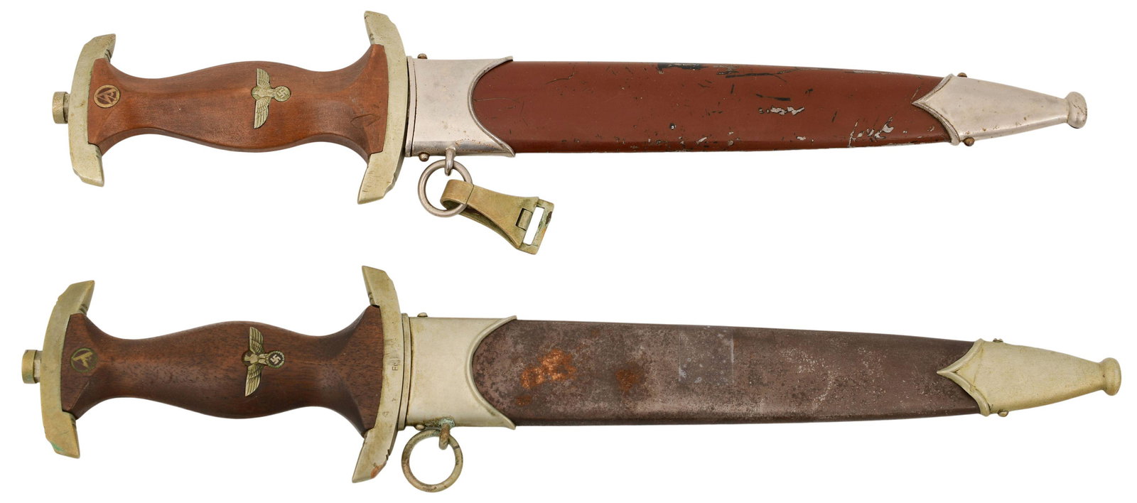 Two WW2 German SA Daggers: Two WW2 German SA Daggers circa 1939-1945 the top dagger marked "Gebruder Heller, Schmalkalden" and the bottom dagger marked "J.P. Sauer & Sohn, Suhl" 14 1/2 in. long (largest)