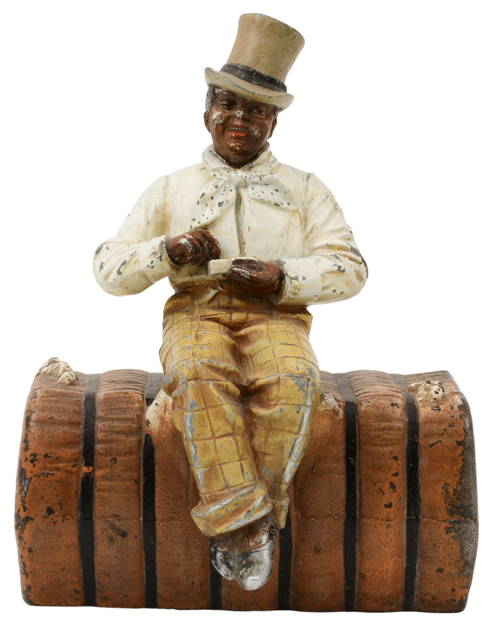 Black Americana "Man on Cotton Bail" Doorstop: Black Americana "Man on Cotton Bail" Doorstop early 20th century the painted metal man seated on a cast iron cotton bail 8 3/4 x 7 x 4 1/2 inches