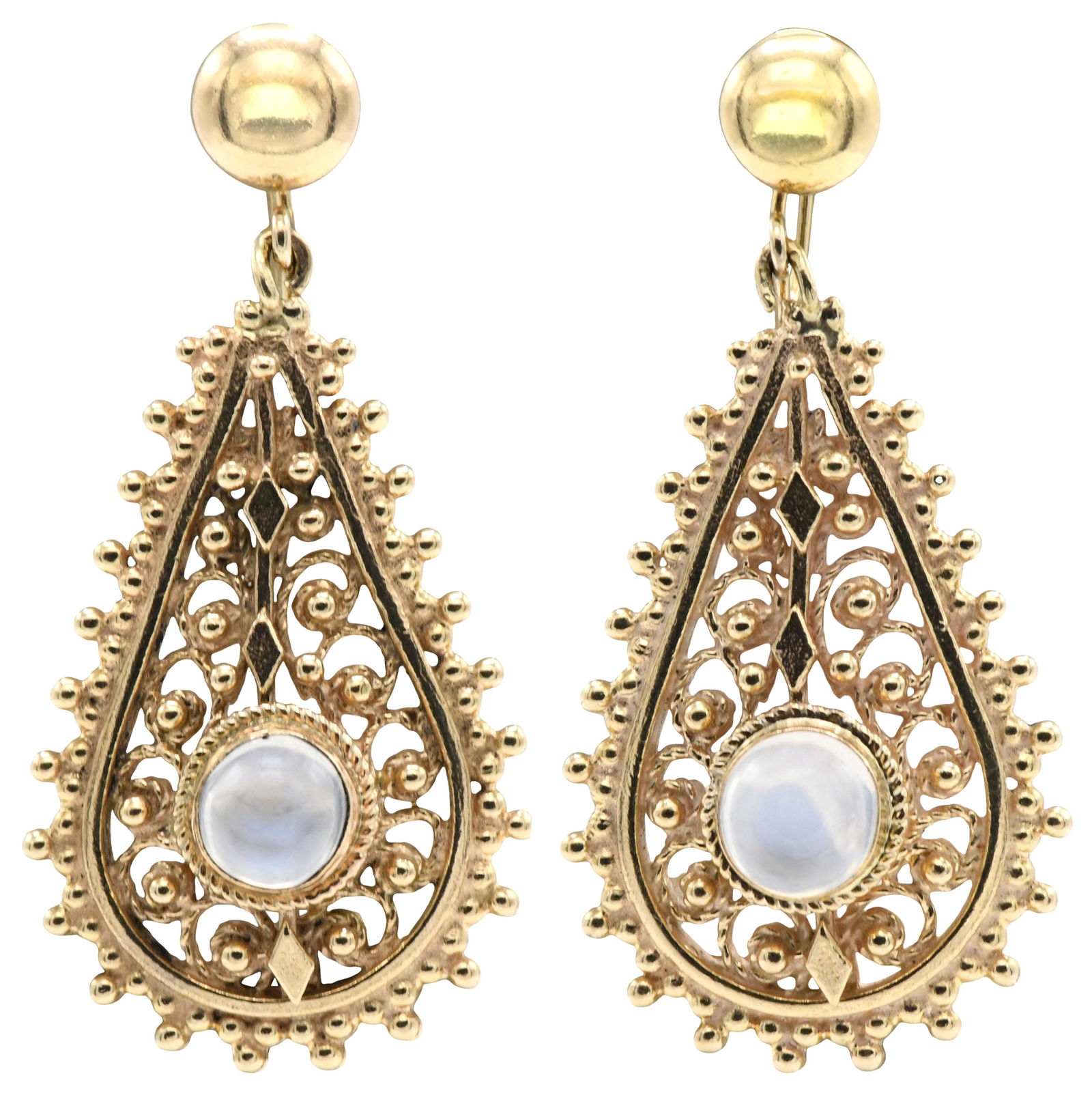 14 Karat Gold & Moonstone Pendant Drop Earrings: 14 Karat Gold & Moonstone Pendant Drop Earringsthe screw back earrings are of filigree design, each earring centers a moonstone cabochon weighing 1.15 carats14 karat yellow gold1 5/8 inches (length)6.