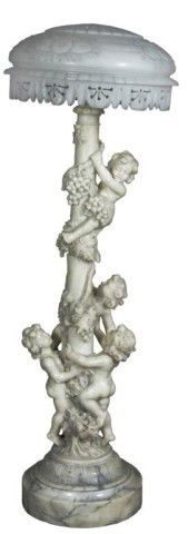 Figural Carved Putti Alabaster & Marble Lamp: Figural Carved Putti Alabaster & Marble Lamp. Carved floor lamp with 4 figural putti climbing up the grapevines twisting up the stem of the lamp; the 4 playful figures are large, with very fine detail