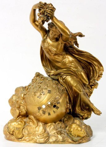 Signed Feuchere Bronze Clock Case: Signed Feuchere Bronze Mantle Clock Case. mid 19th Century figural dore bronze clock case with a maiden wearing a long robe blowing in the wind, she is seated on a sphere and holding a leafy bouquet. 