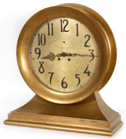 Large Chelsea Ship's Bell Mantle Clock: Large Chelsea Ship's Bell Mantle Clock. 12 in. Silvered dial has some pitting, tarnish and spotting; signed The John Brenner Jewelry Co. Youngstown, O, over Chelsea Ship's Bell. Has fancy pierced hand