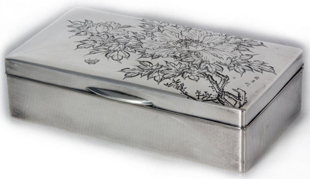 Silver Oriental Azalea Box: Silver Oriental Azalea Box. Covered sterling silver box with a teakwood lined interior, the lid is engraved with a pair of blooming oriental azalea flowers and leaves on their branches, a small butter