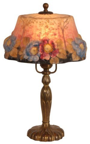 Pairpoint Puffy Dogwood Boudoir Lamp: Pairpoint Puffy Dogwood Boudoir Lamp. 8 in. Stratford shade with pink, blue and yellow flowers, green and yellow leaves, a black border at the rim and a satin pink background; signed. On a molded sign