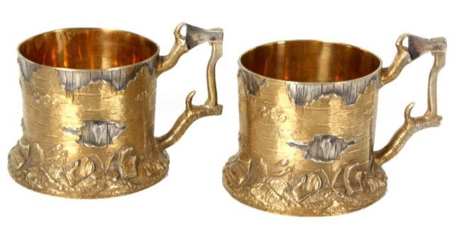 Pr. Russian Silver Tea Cup Holders: Pr. Russian Silver Tea Cup Holders. The Silver cups are designed as the base of a tree trunk, with gold wash over the bark, a pair of branches with an axe form the handle. 84 zol Kokoshnik and makers