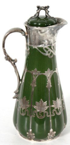 Gerard Dufraisseix Abbot Silver Overlay Pitcher: Gerard Dufraisseix Abbot Silver Overlay Limoges Pitcher. Fine green porcelain pitcher has a silver overlaid collar, spout and handle and floral nouveau decoration throughout; the lid has silver around